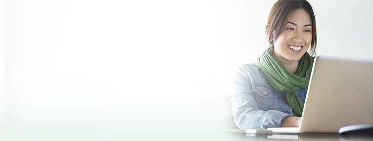 Woman paying her bills online